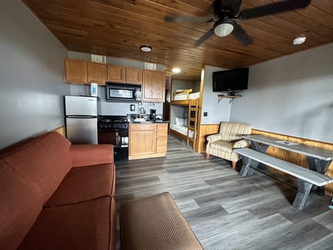 Lodge Suite Downstairs w/ Deck, 1 Queen, 1 Twin Bunk Bed, 1 Sofa Bed | Individually furnished, laptop workspace, soundproofing, free WiFi