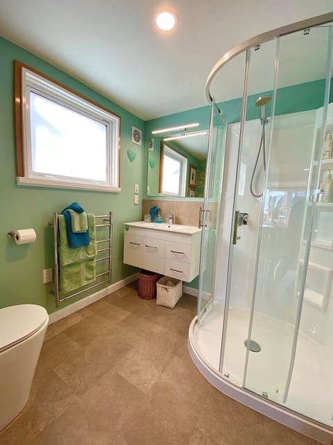 Superior Apartment, 1 Bedroom, Garden View (The Garden Apartment ) | Bathroom | Shower, eco-friendly toiletries, hair dryer, bathrobes