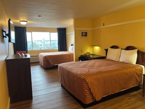 Standard Room, 2 Queen Beds | Desk, blackout drapes, iron/ironing board, free WiFi