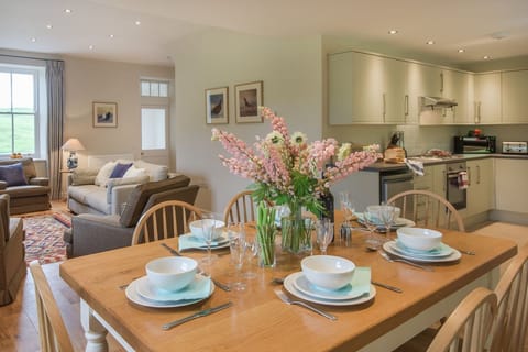 Pathhead Farmhouse - dining table in open plan living area