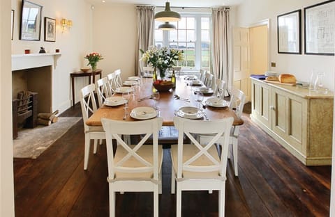 Ground floor: Formal dining room with open log fire