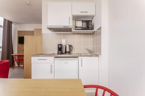 Apartment, 1 Bedroom | Private kitchen | Fridge, microwave, stovetop, coffee/tea maker