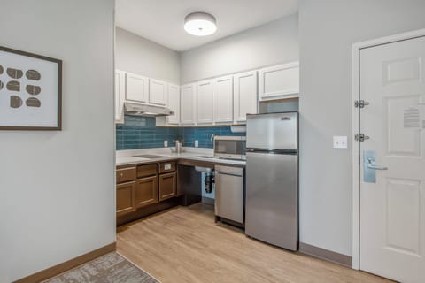 Desk, laptop workspace, blackout drapes, iron/ironing board