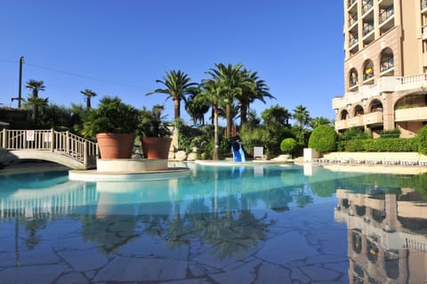 Outdoor pool, open 9:00 AM to 7:30 PM, sun loungers