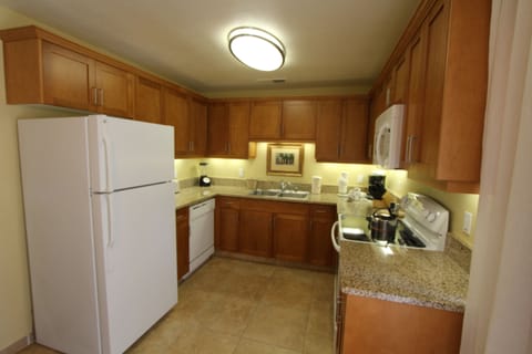 Family Condo, 2 Bedrooms | Private kitchen | Full-size fridge, microwave, stovetop, dishwasher