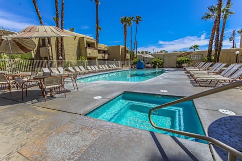 Outdoor pool, pool umbrellas, sun loungers