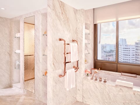 Executive Suite | Bathroom | Shower, designer toiletries, hair dryer, bathrobes