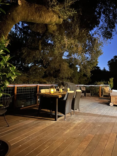 One alternative dining space for larger groups is the dining area on the deck.