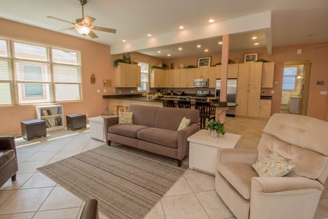 Main Level | Living Room - Enter into the open living, dining, and kitchen area. This is great for gathering the entire family all into one room.