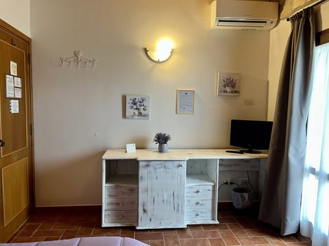 Double or Twin Room | Minibar, in-room safe, desk, free WiFi