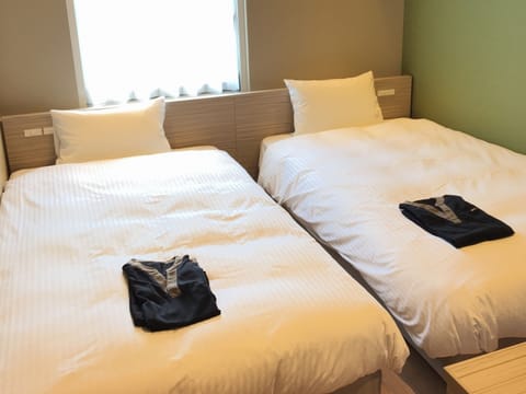 Standard Twin Room, Non Smoking | Down comforters, desk, blackout drapes, free WiFi