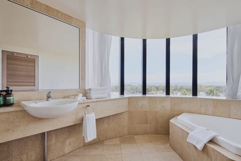 Suite, Ocean View | Bathroom | Separate tub and shower, free toiletries, hair dryer, bathrobes