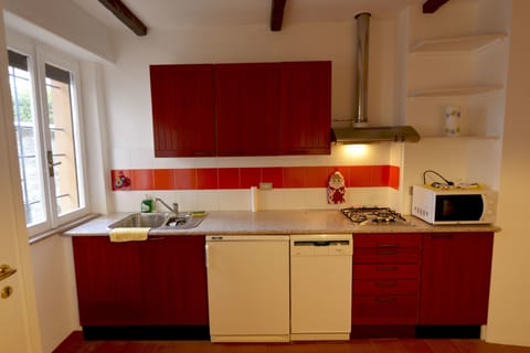 Apartment, 1 Bedroom | Private kitchen | Fridge, microwave, stovetop, dishwasher