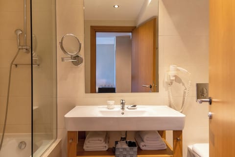 Standard Twin Room, No View | Bathroom | Eco-friendly toiletries, hair dryer, slippers, towels