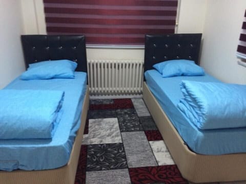 Basic Twin Room, 2 Bedrooms | 2 bedrooms, minibar, free WiFi, bed sheets