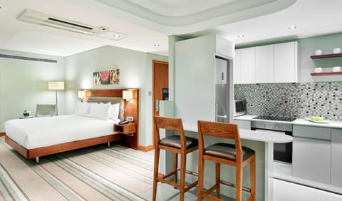 Junior Suite, 1 King Bed | Private kitchen | Fridge, stovetop, coffee/tea maker, cookware/dishes/utensils