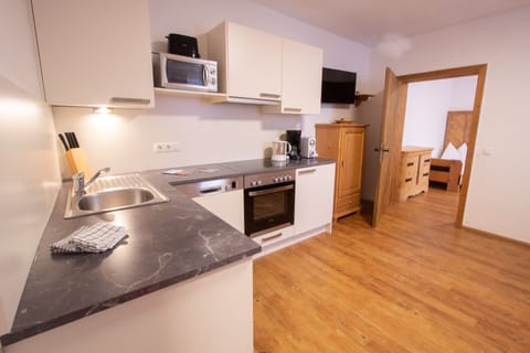 Apartment, 2 Bedrooms, Balcony (Wanderlust, incl. cleaning fee EUR 100) | Private kitchen | Full-size fridge, microwave, dishwasher, coffee/tea maker