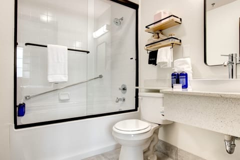 Combined shower/tub, eco-friendly toiletries, hair dryer, towels