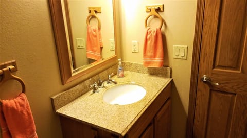 All Baths have custom tile, oak cabinetry and solid granite counters. Nice!