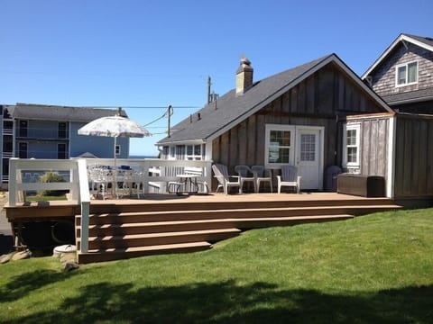 Large grass backyard with large new deck. BBQ and lots of comfortable seating.