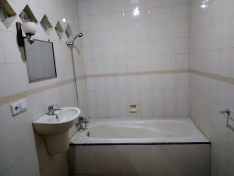 Standard Double Room | Bathroom | Separate tub and shower, hydromassage showerhead