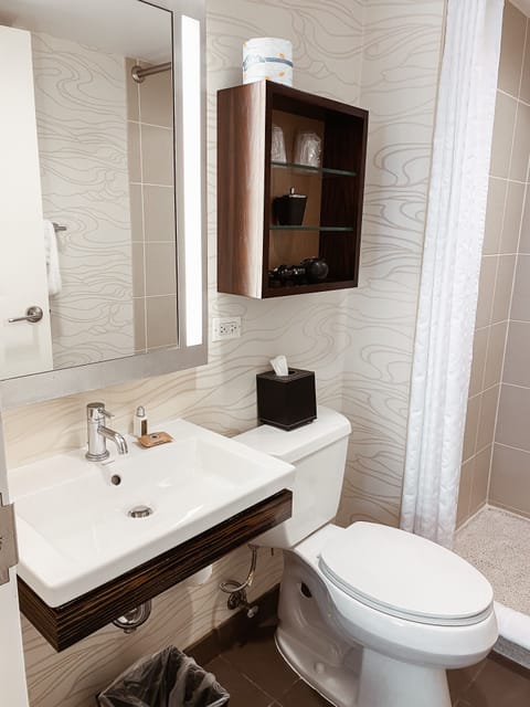 Designer toiletries, hair dryer, bathrobes, towels