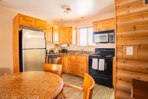 Family Room | Private kitchen | Microwave, coffee/tea maker, paper towels