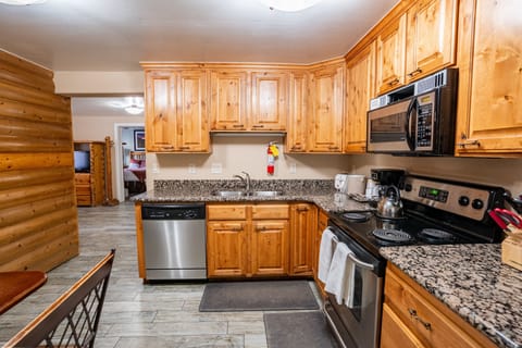 Family Room | Private kitchen | Microwave, coffee/tea maker, paper towels