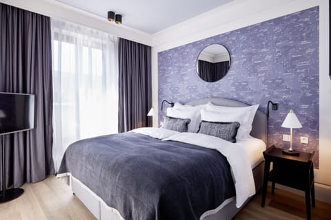 Premium bedding, down comforters, free minibar, in-room safe