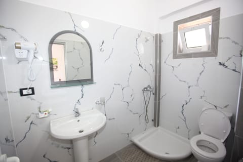 Triple Room, Sea View | Bathroom | Shower, free toiletries, hair dryer, towels