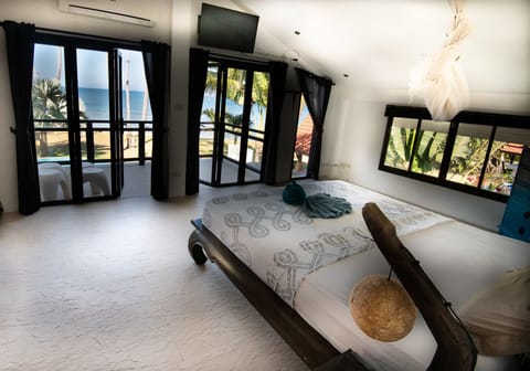 Exclusive Villa, 5 Bedrooms, Pool Access, Beachfront | 1 bedroom, in-room safe, individually furnished, laptop workspace