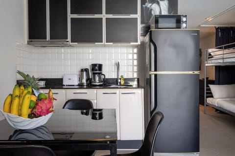 Deluxe Apartment, 1 Bedroom, Pool Access | Private kitchen | Fridge, microwave, stovetop, coffee/tea maker