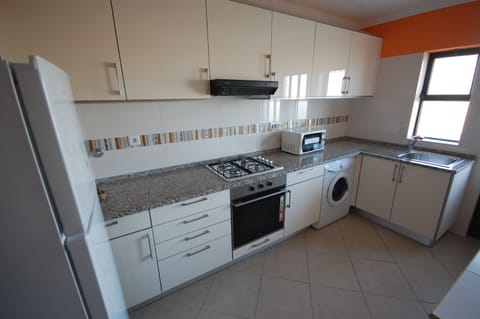 Apartment, 2 Bedrooms | Private kitchen | Fridge, microwave, oven, stovetop