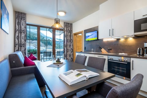 Classic Apartment | Living room | 32-inch flat-screen TV with cable channels, TV, heated floors