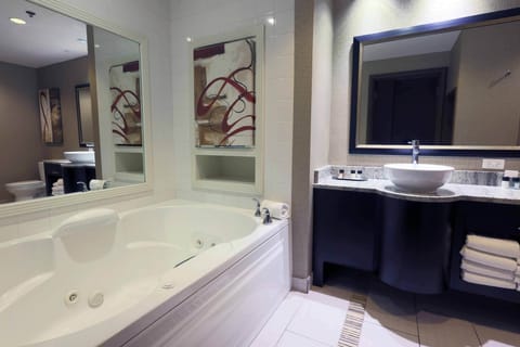 Junior Suite, 2 Queen Beds, Non Smoking | Bathroom | Separate tub and shower, free toiletries, hair dryer, towels