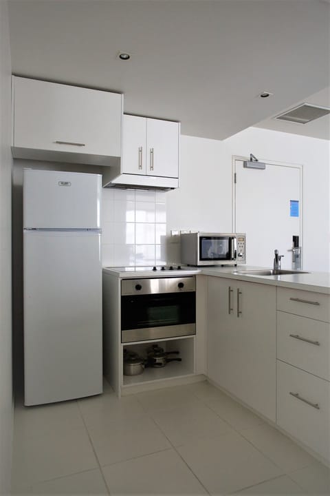 Suite, 2 Bedrooms | Private kitchen | Fridge, microwave, stovetop, dishwasher