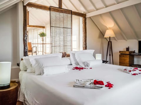 Premium bedding, free minibar, in-room safe, individually decorated