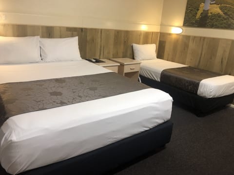 Deluxe Triple Room, Multiple Beds | Free WiFi, bed sheets