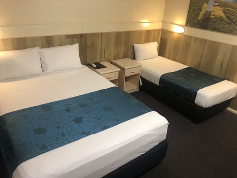 Deluxe Triple Room, Multiple Beds | Free WiFi, bed sheets