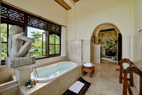 One Bedroom Suite | Bathroom | Combined shower/tub, deep soaking tub, rainfall showerhead