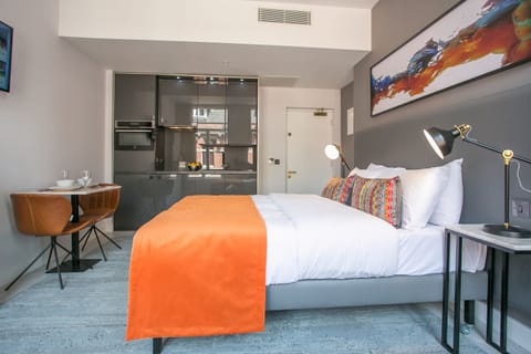 Deluxe Studio, Kitchenette, City View | In-room safe, individually decorated, individually furnished