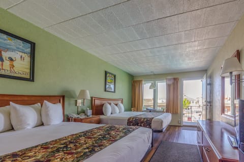 Standard Room, Multiple Beds, Pool View | In-room safe, blackout drapes, iron/ironing board, free WiFi