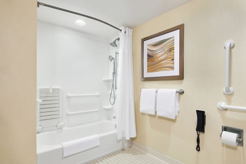 Combined shower/tub, designer toiletries, hair dryer, towels