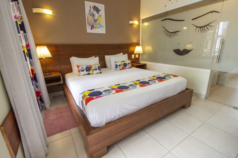 Comfort Double Room, 1 King Bed, Pool Access, Ground Floor | Minibar, in-room safe, individually decorated, individually furnished