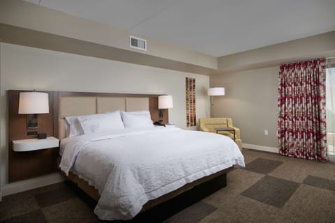 Suite, 1 King Bed, Refrigerator & Microwave (Wet bar) | Blackout drapes, iron/ironing board, free cribs/infant beds
