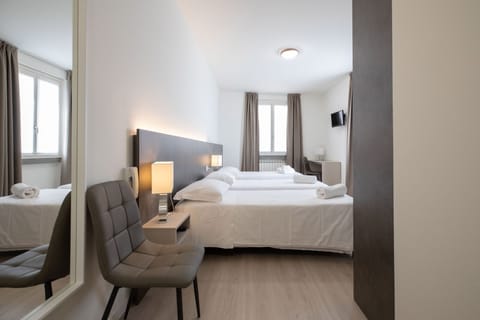 Triple Room | Desk, free WiFi, bed sheets, wheelchair access