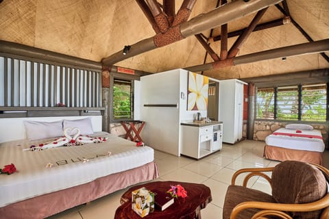 Oceanfront Family Bure | In-room safe, individually decorated, bed sheets