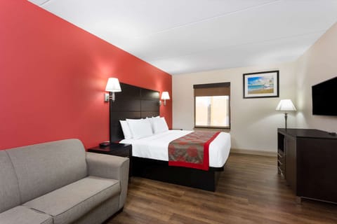 Suite, 1 King Bed, Non Smoking | Desk, blackout drapes, iron/ironing board, rollaway beds