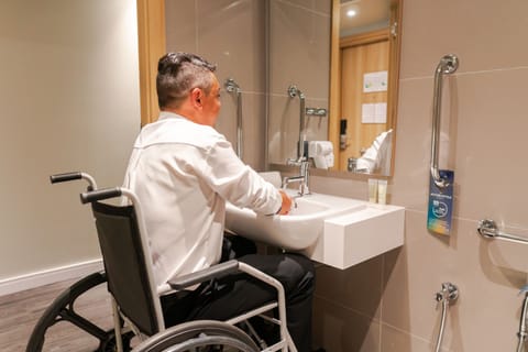 Superior Room for Reduced Mobility | Bathroom | Shower, eco-friendly toiletries, hair dryer, towels