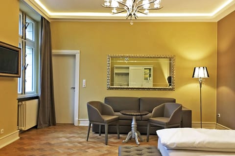 Superior Suite, 1 Queen Bed with Sofa bed | Living area | Flat-screen TV